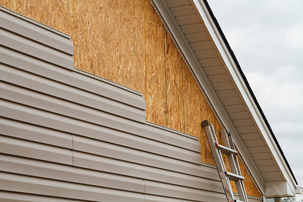 Professional Siding Repair technician working in Pikesville, MD